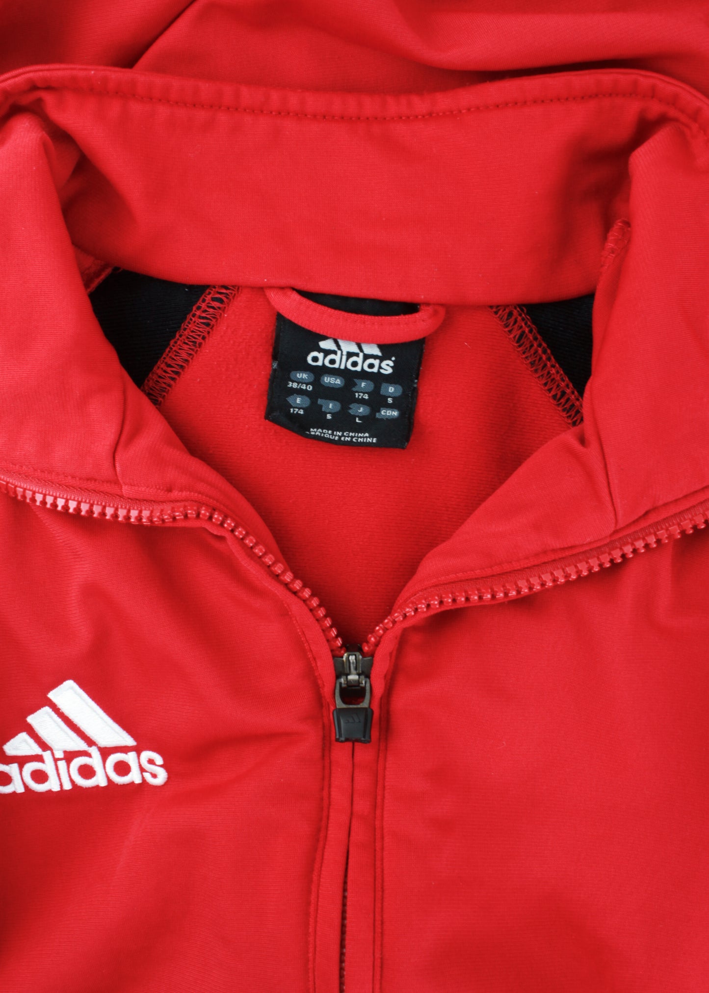 Adidas track jacket in red