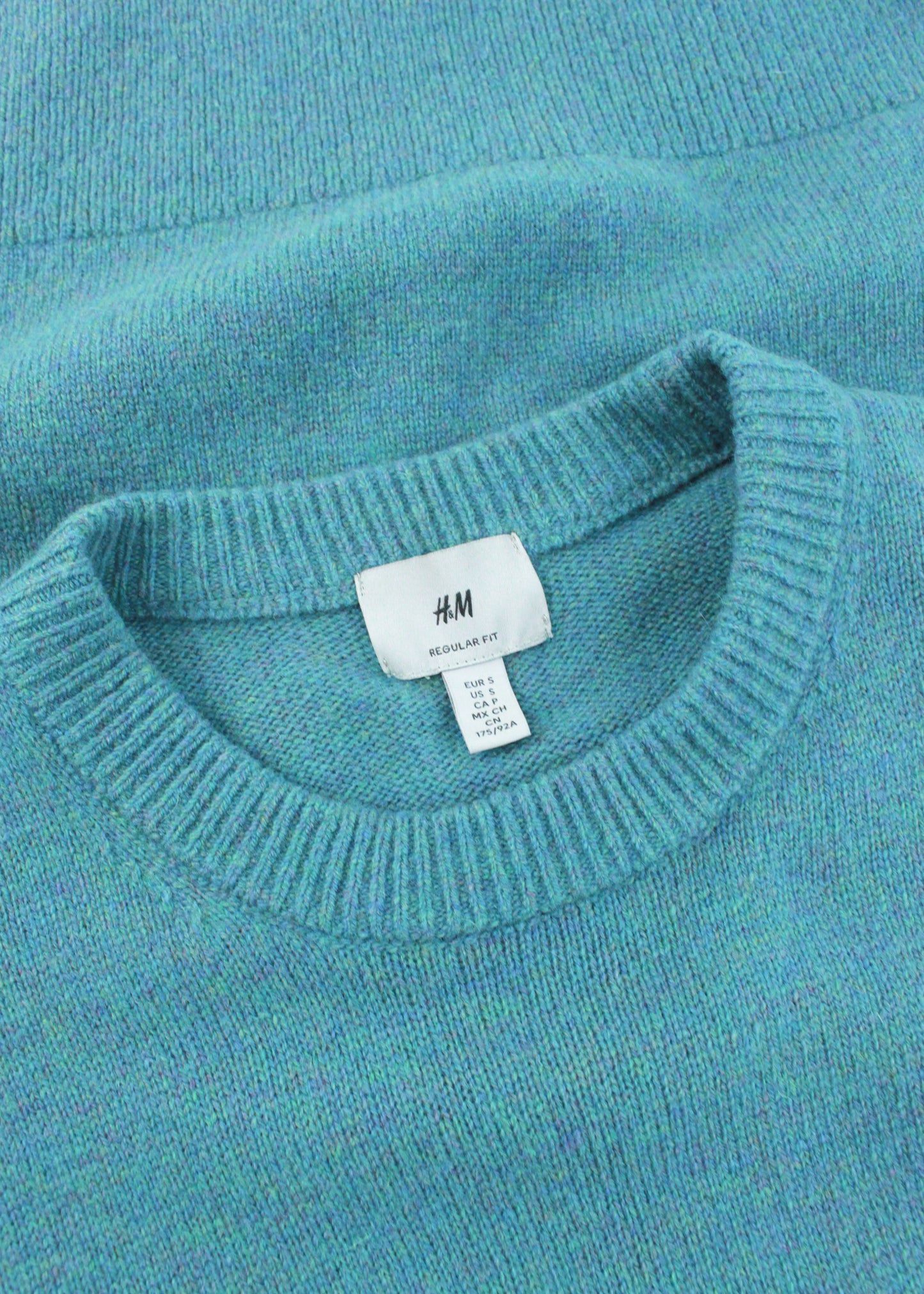 Woolen sweater in blue/green