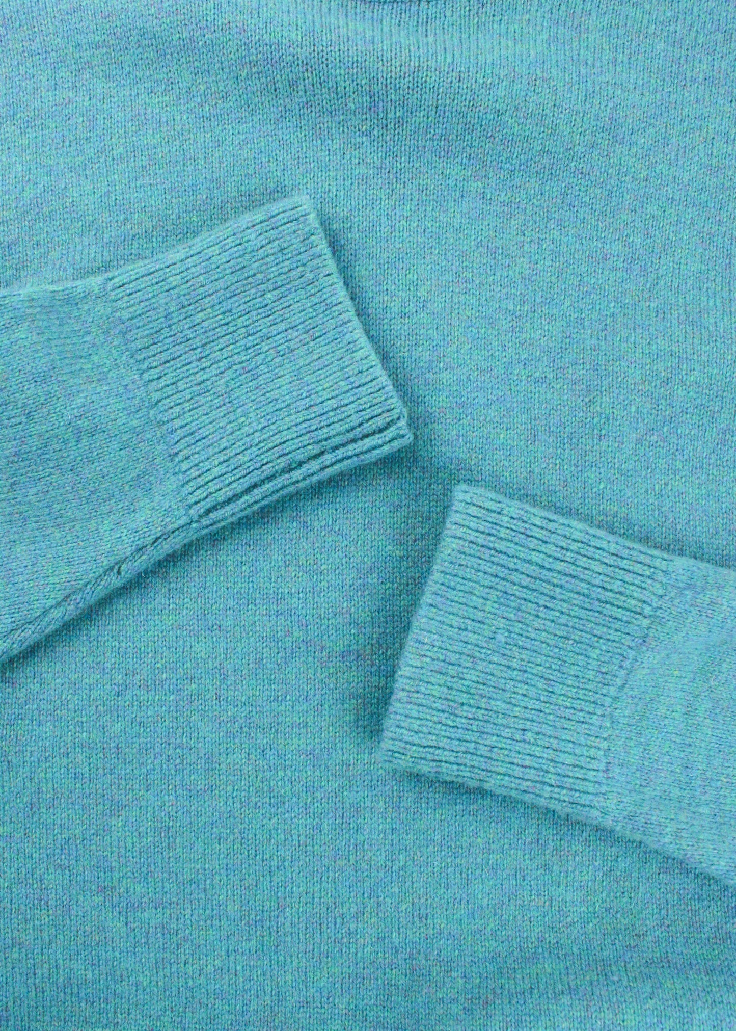 Woolen sweater in blue/green