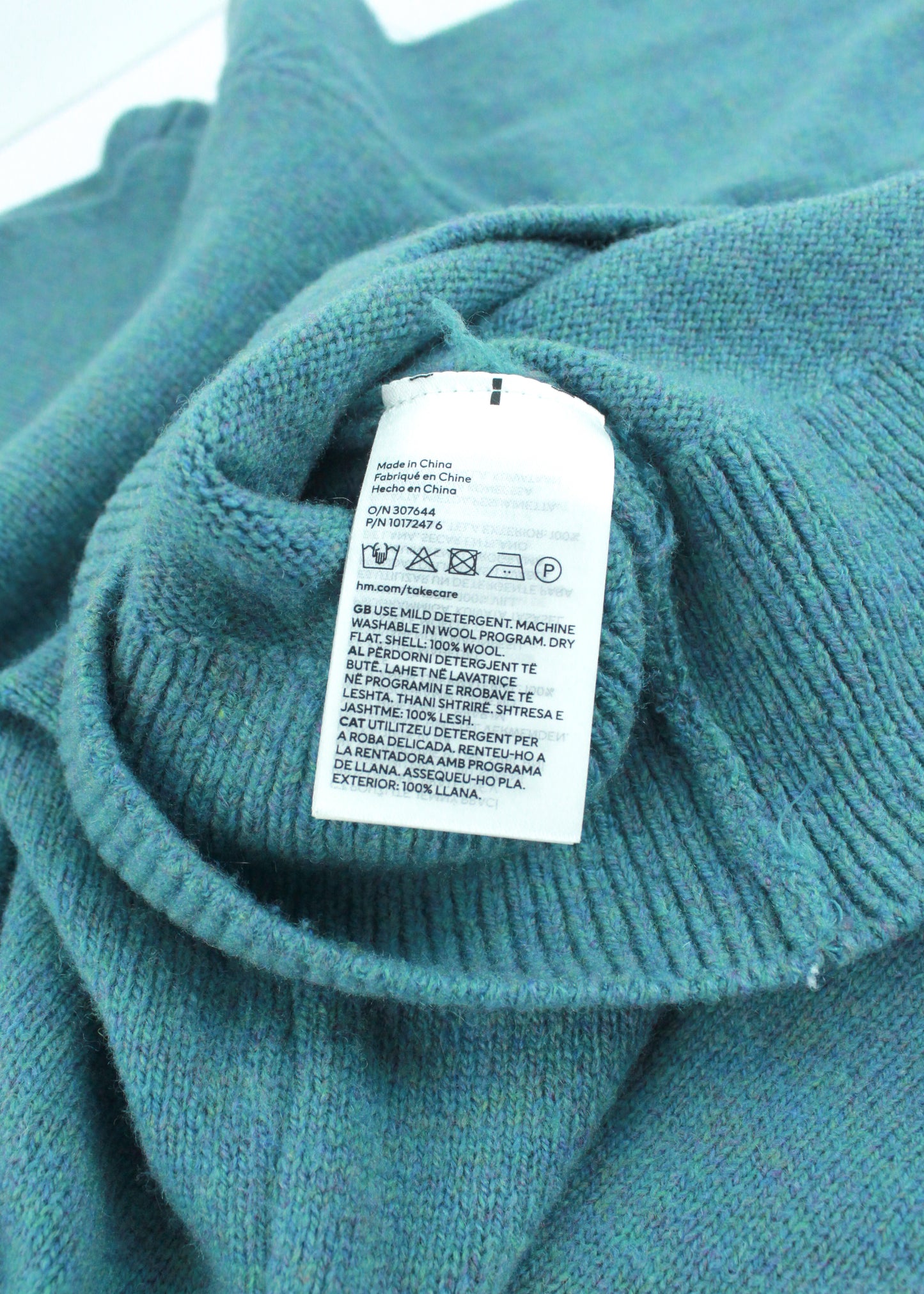 Woolen sweater in blue/green