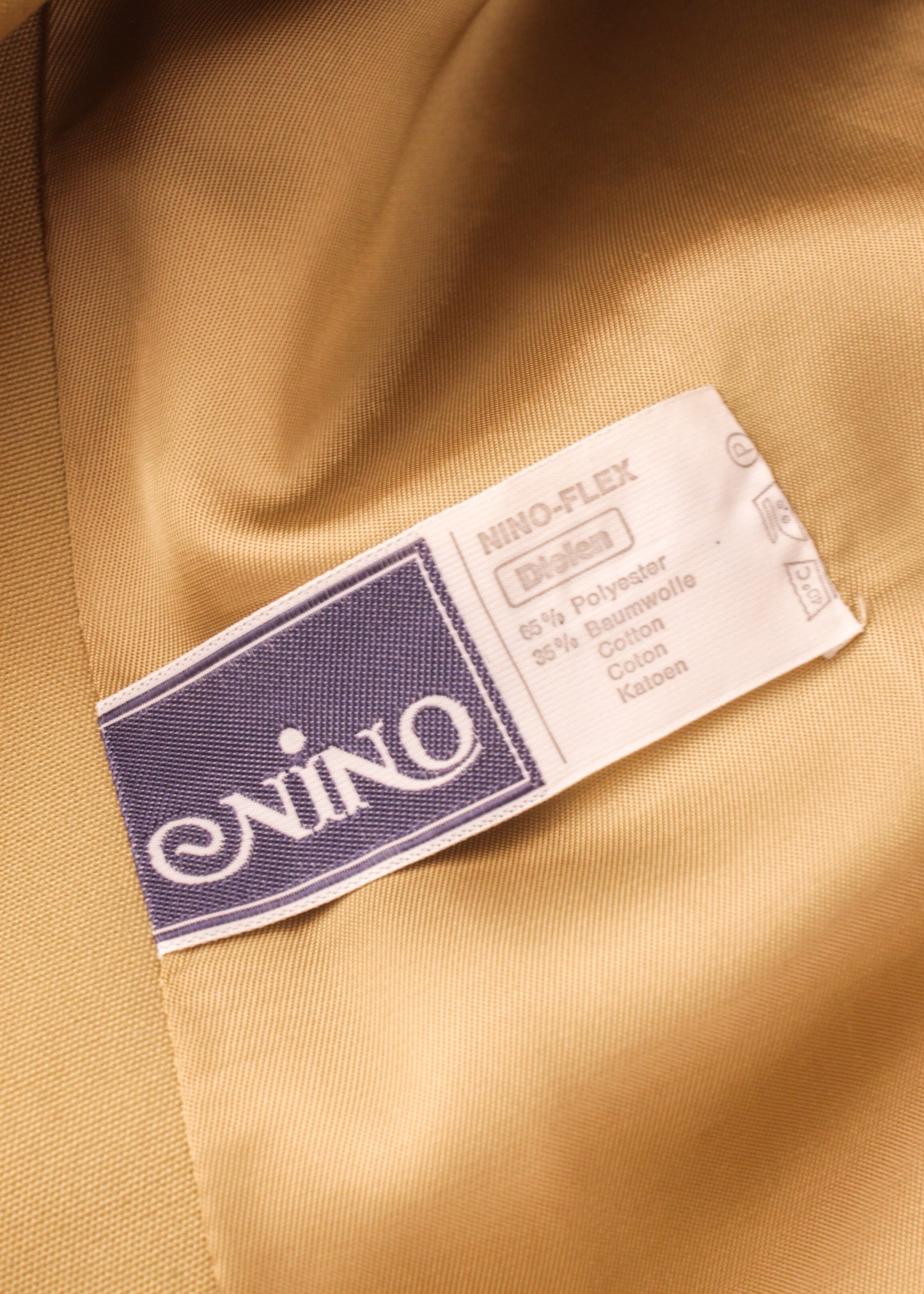 Vintage trench coat in sand
