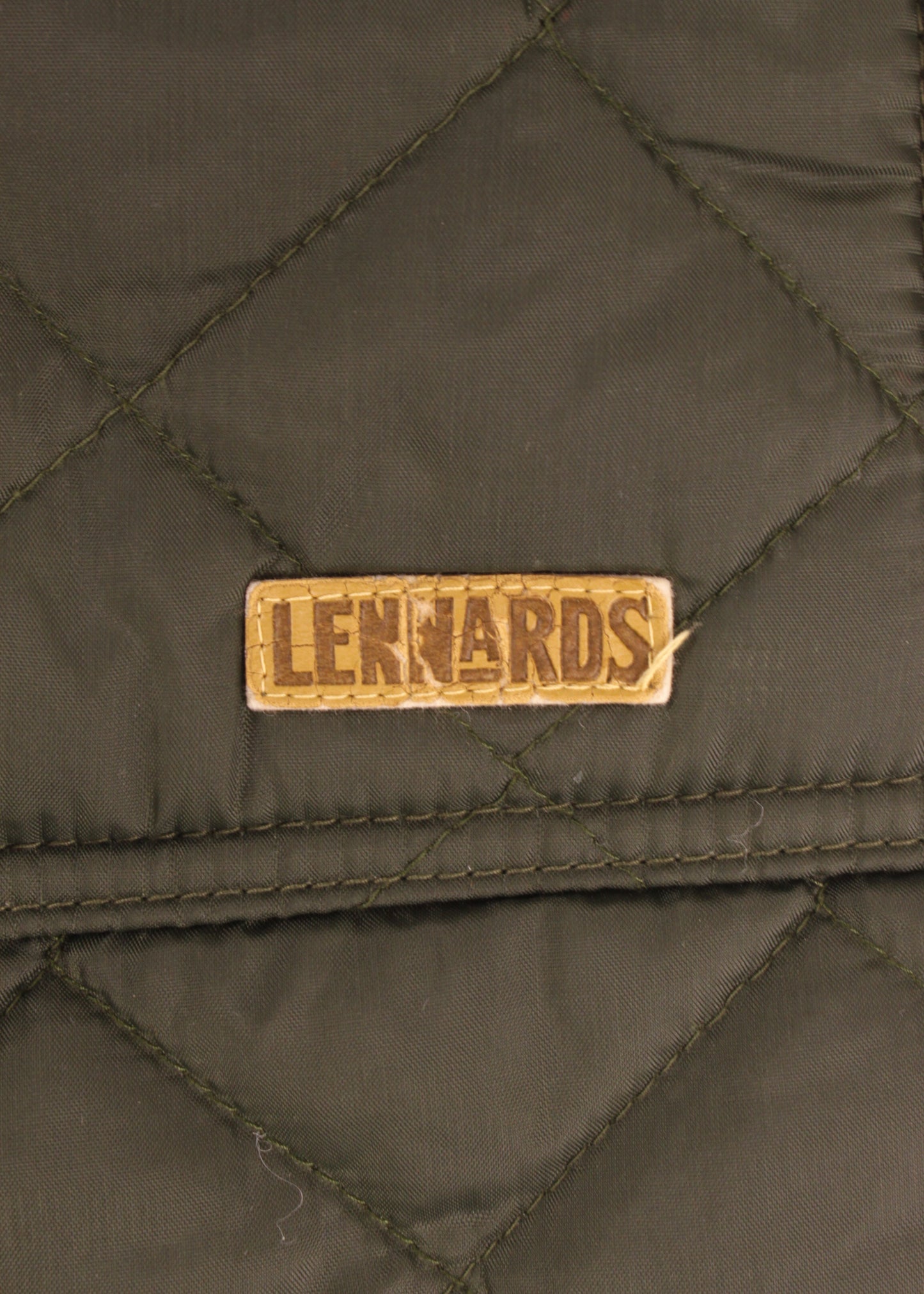 Vintage men's quilted jacket in pine green
