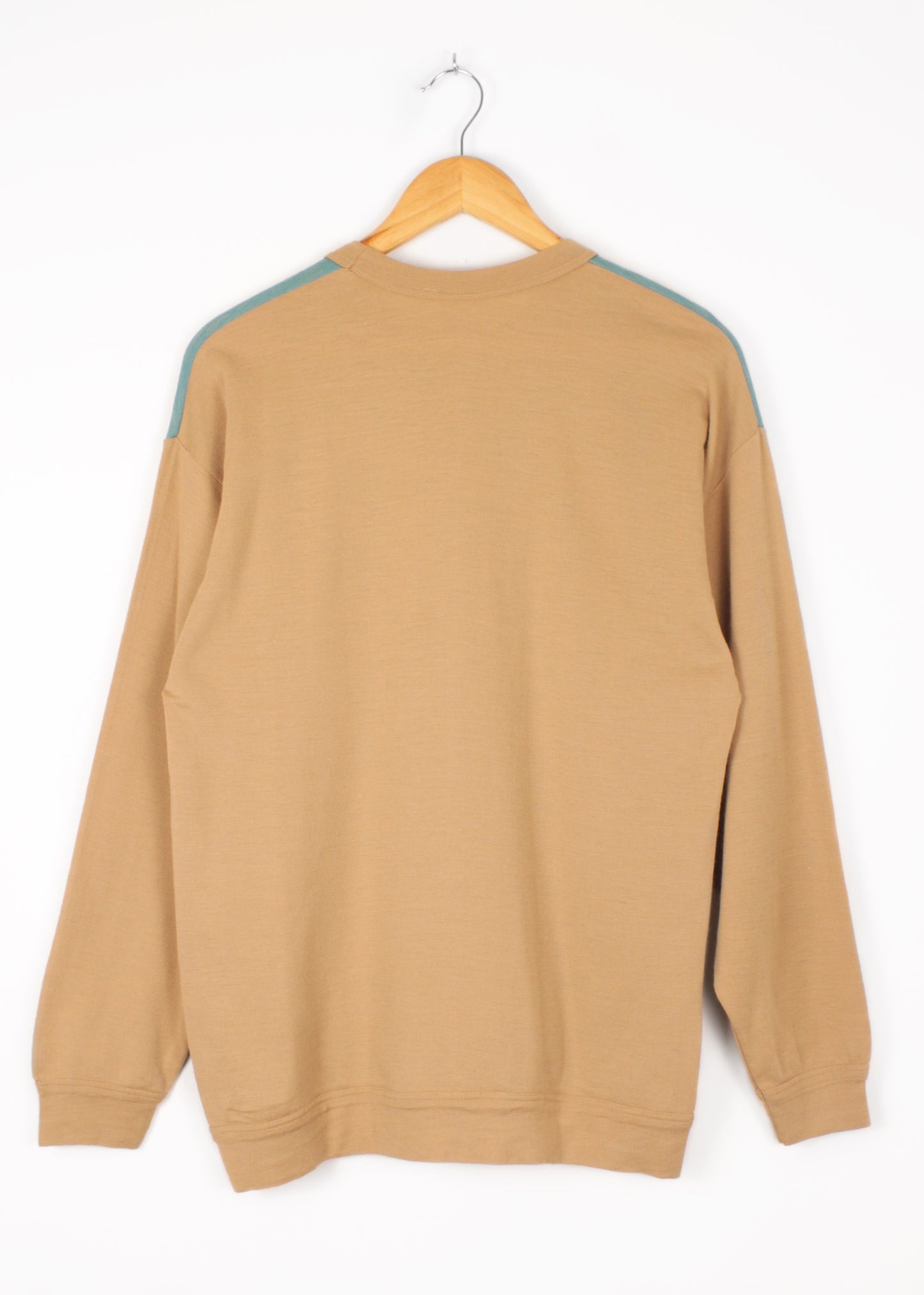 Woolen jumper in sand and blue