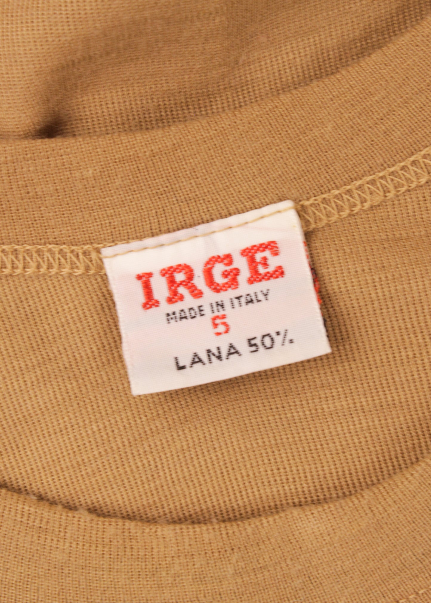Woolen jumper in sand and blue