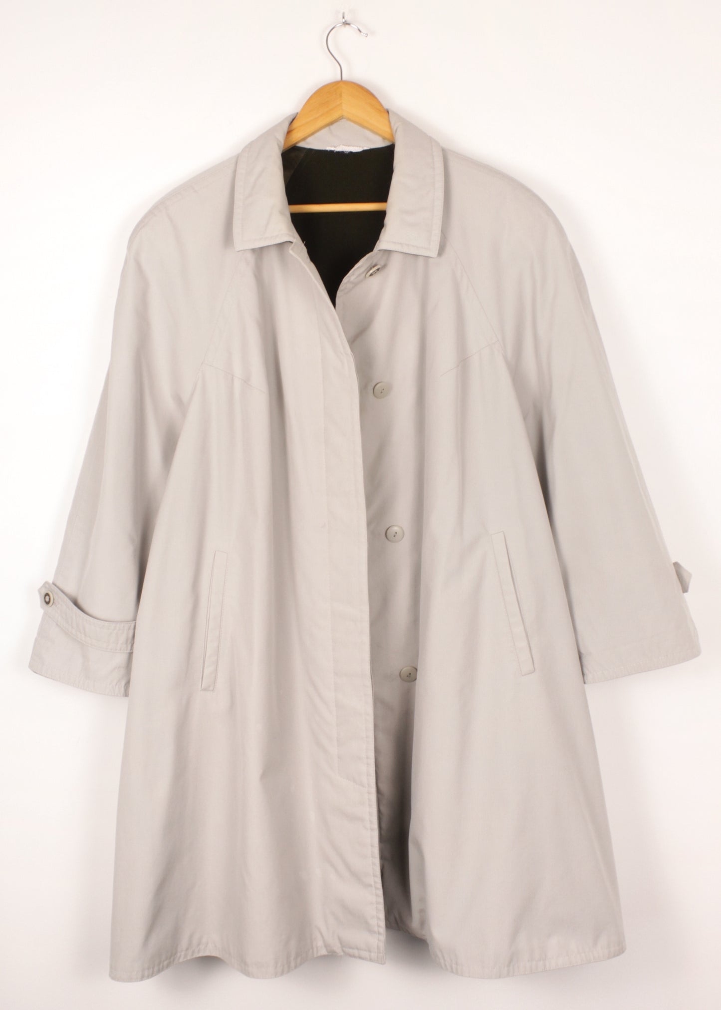Warm trench coat in grey with green lining