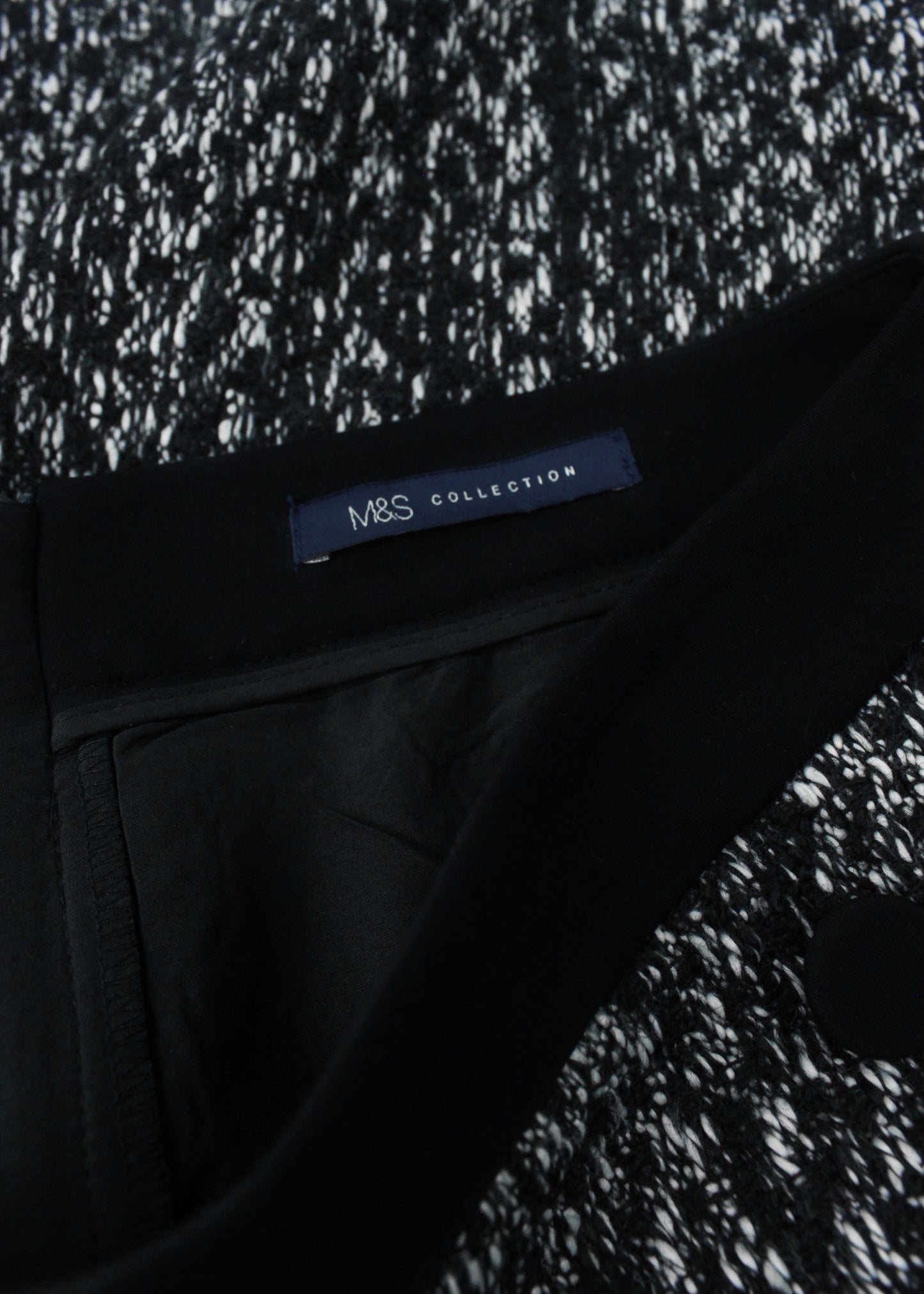 Bodycon skirt in black with decorative buttons