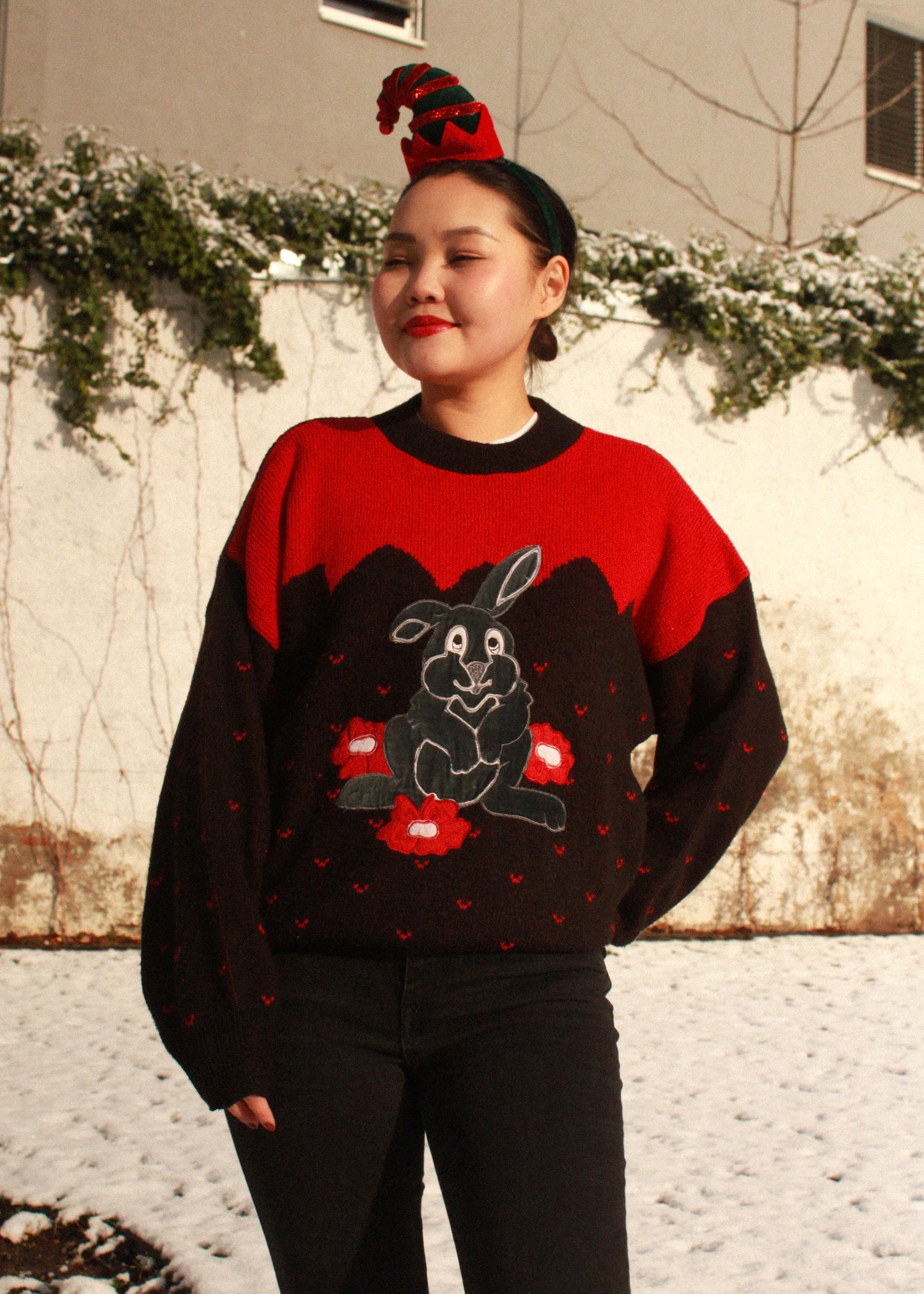 Vintage woolen knit sweater in black and red with rabbit print
