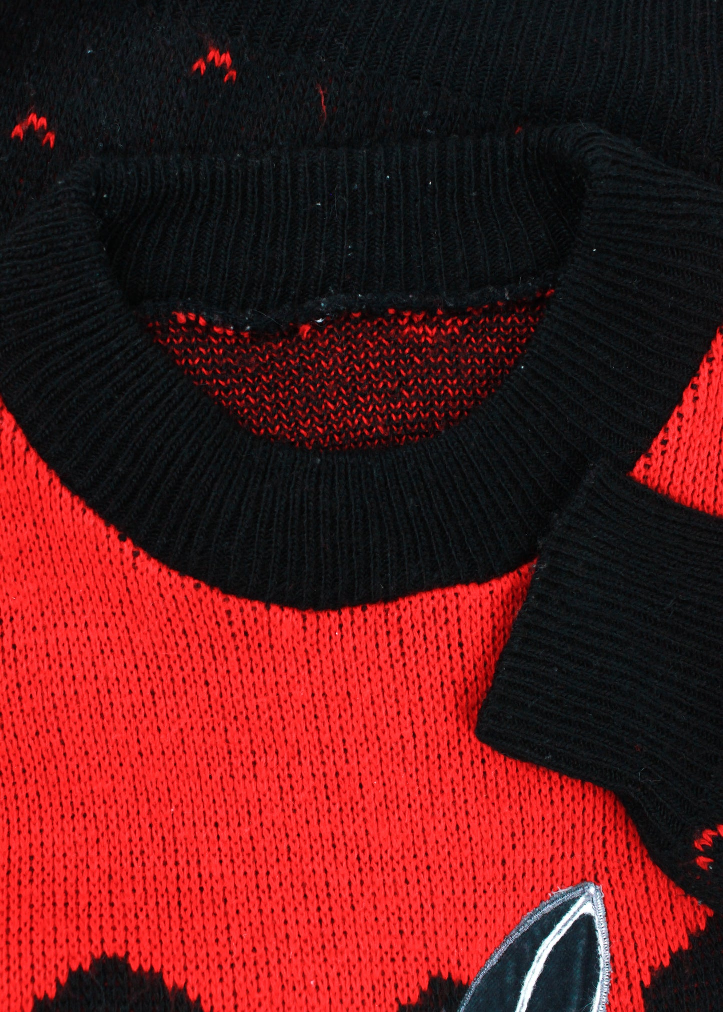 Vintage woolen knit sweater in black and red with rabbit print
