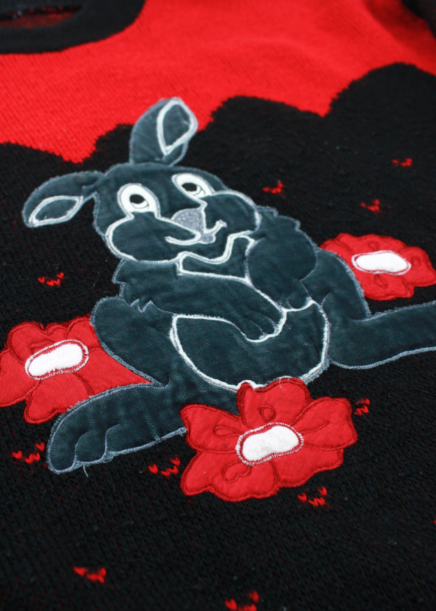 Vintage woolen knit sweater in black and red with rabbit print