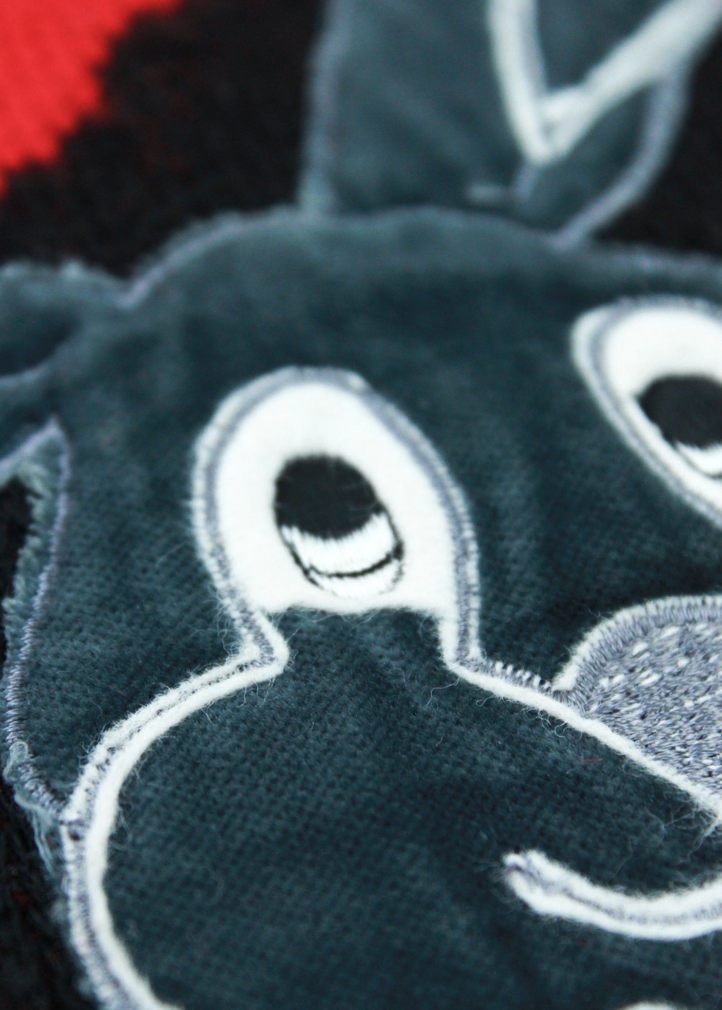 Vintage woolen knit sweater in black and red with rabbit print