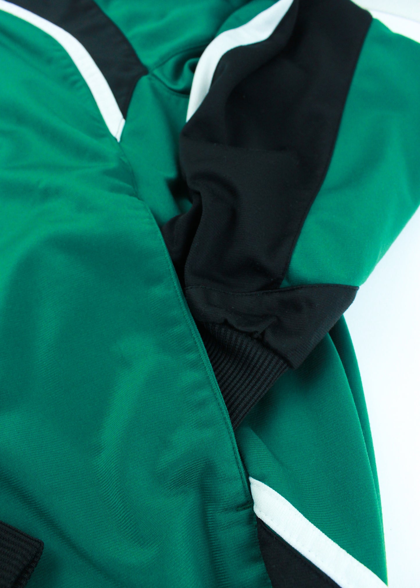 Saller track jacket in green and black