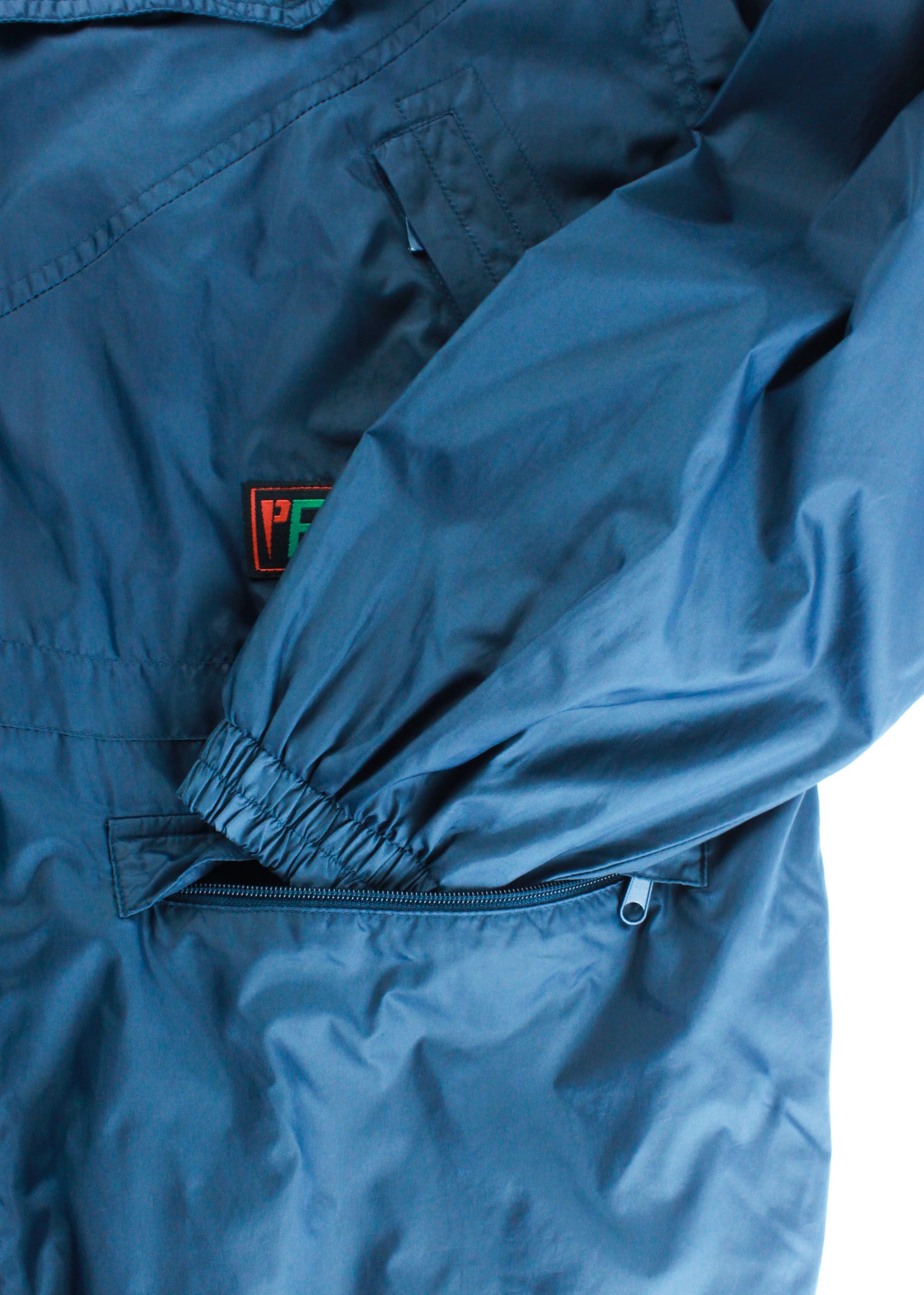 Vintage windbreaker in navy and green