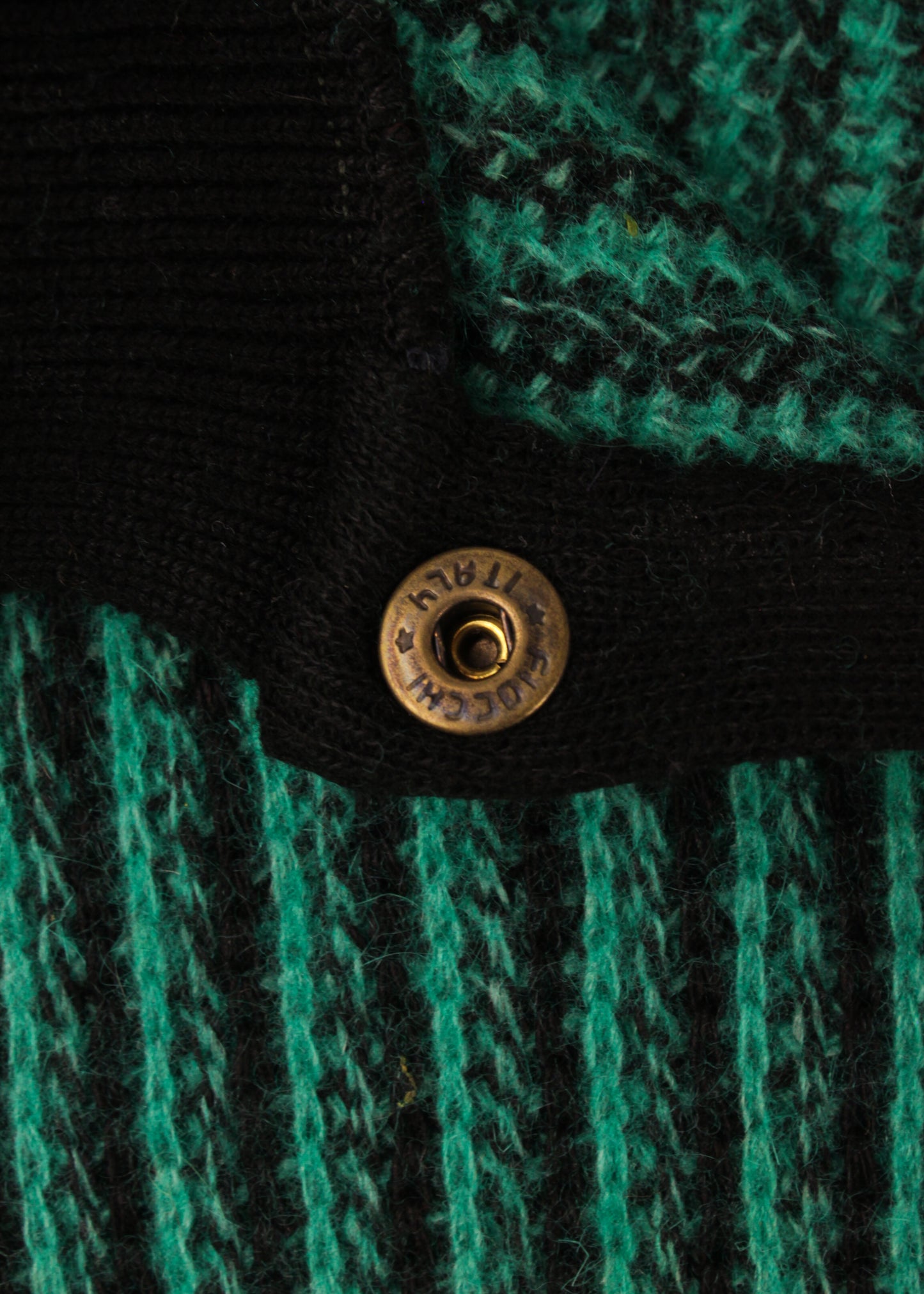 Striped sweater in green and black