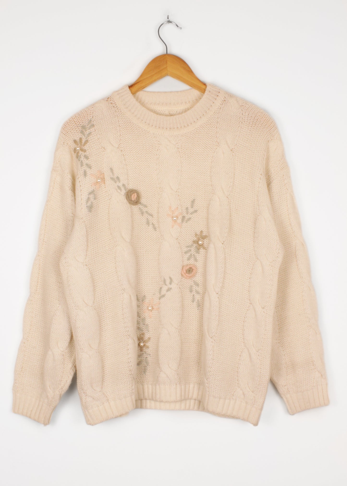 Woolen sweater in cream