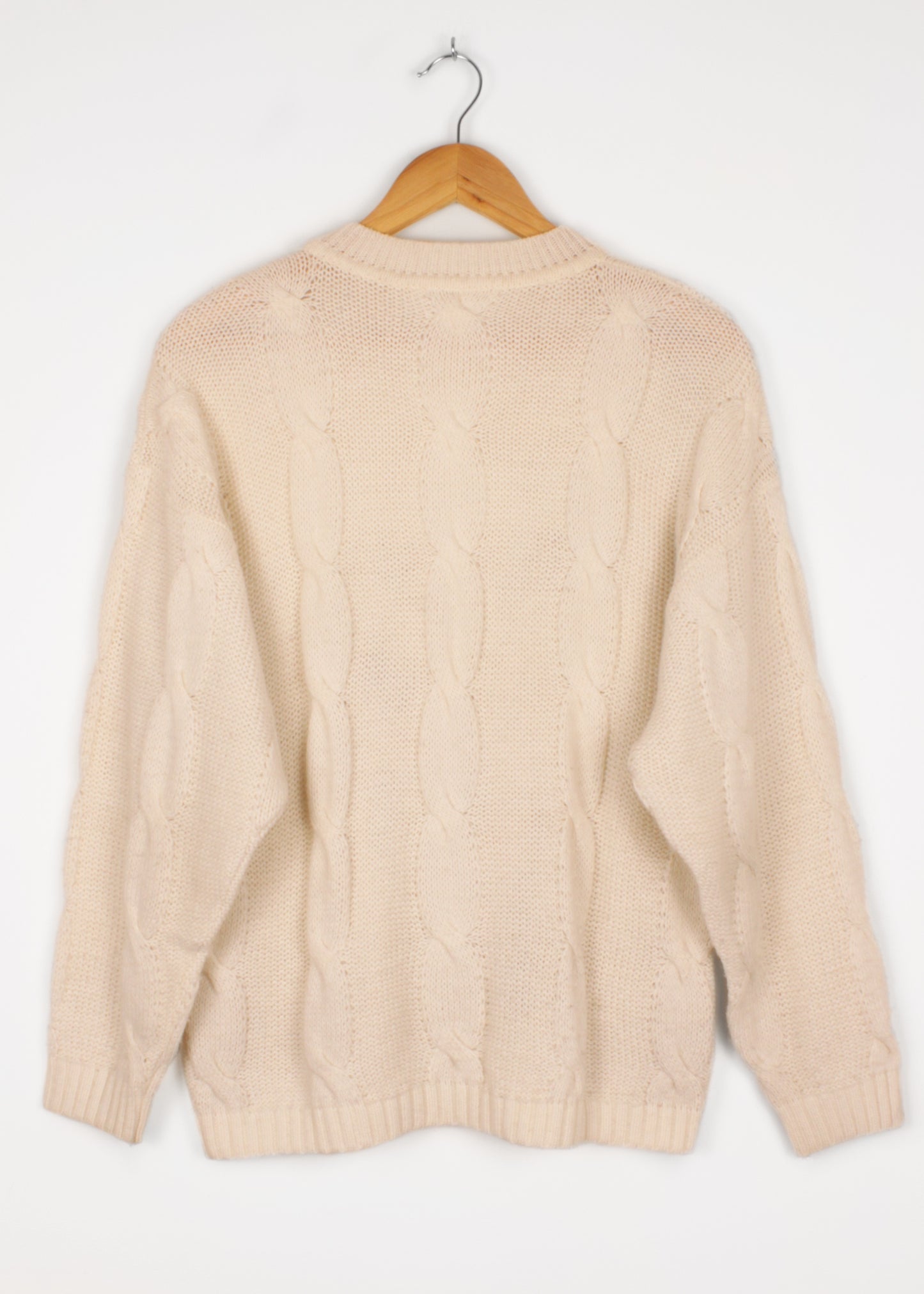 Woolen sweater in cream