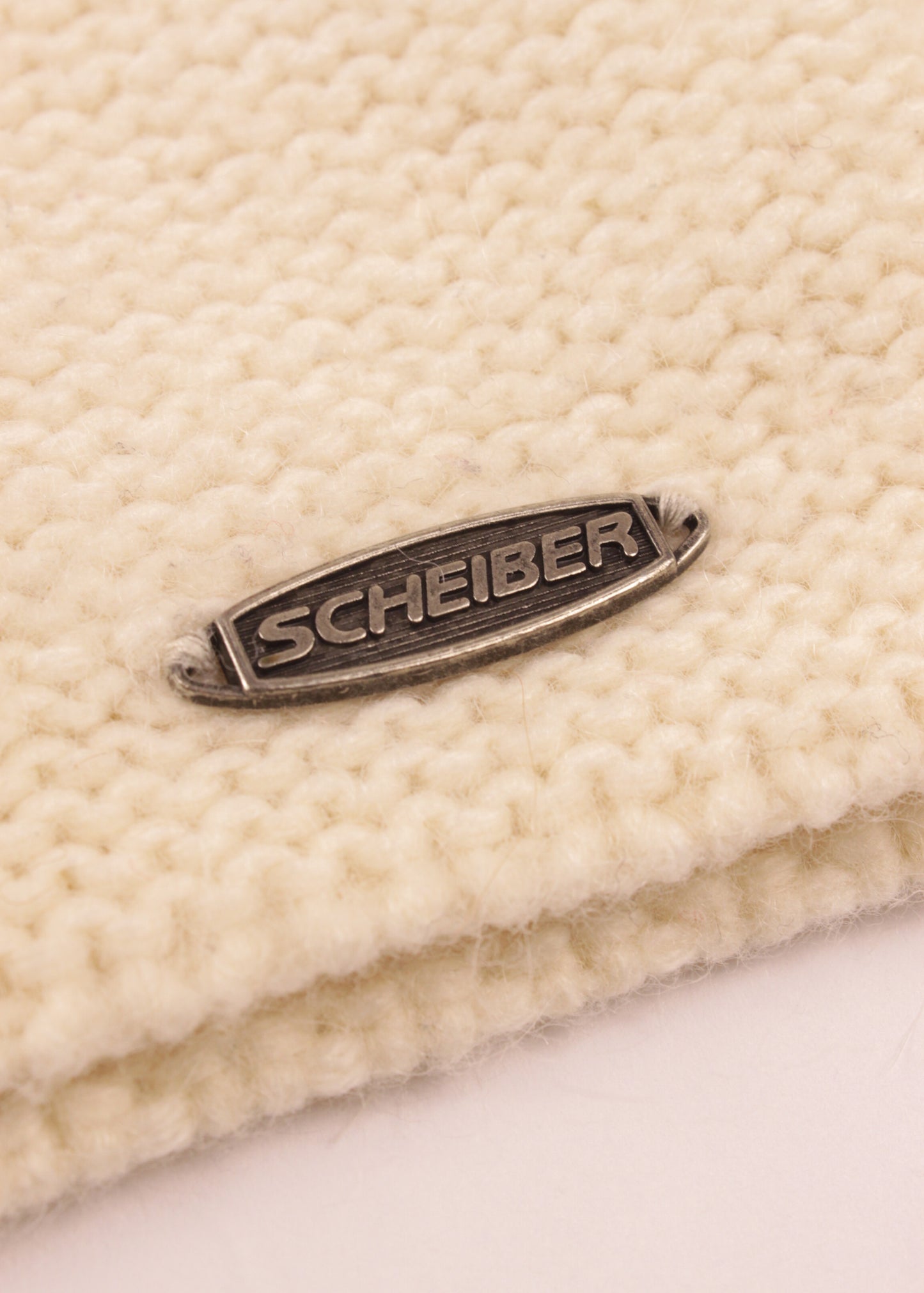 Woolen sweater in cream