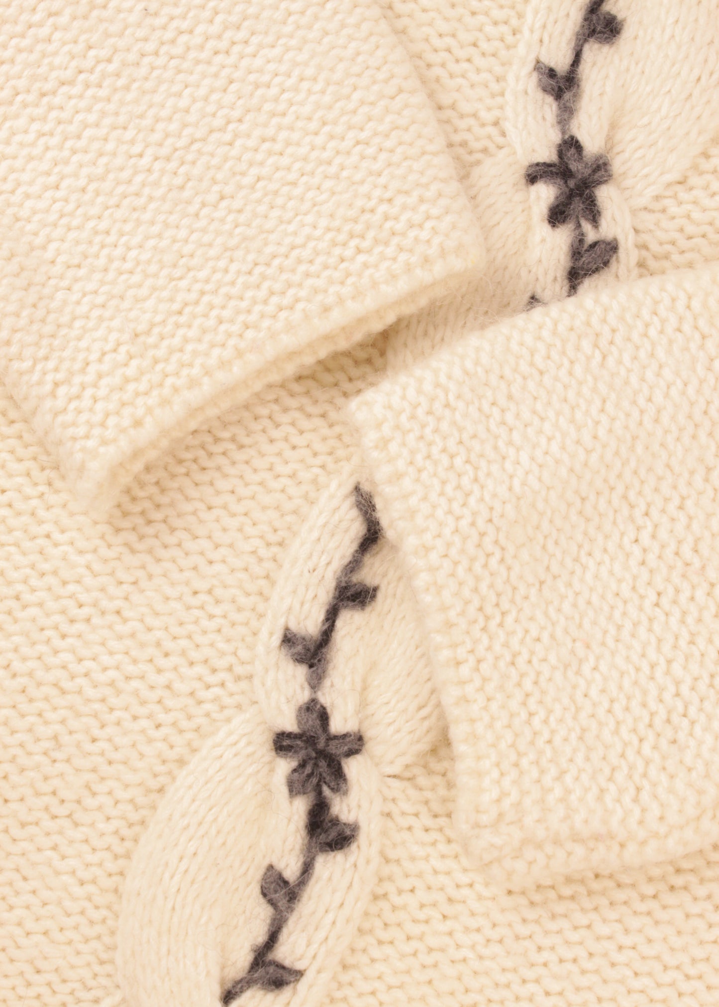 Woolen sweater in cream