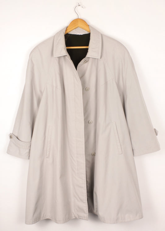 Warm trench coat in grey with green lining