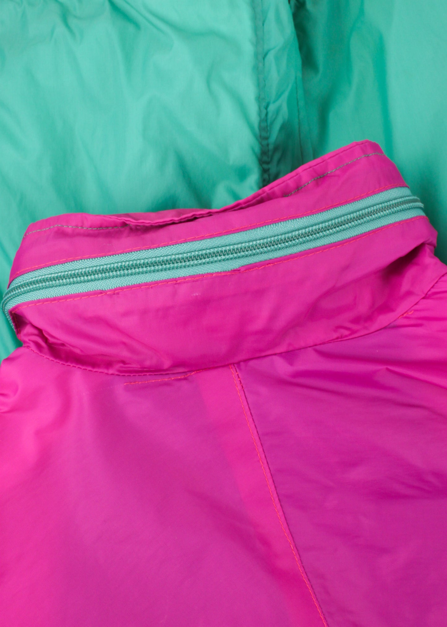 Windbreaker in green and magenta