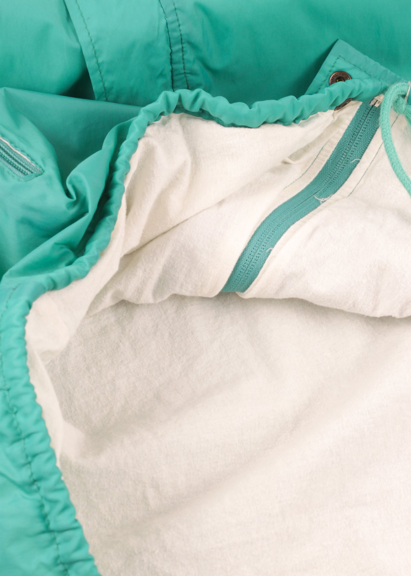 Windbreaker in green and magenta