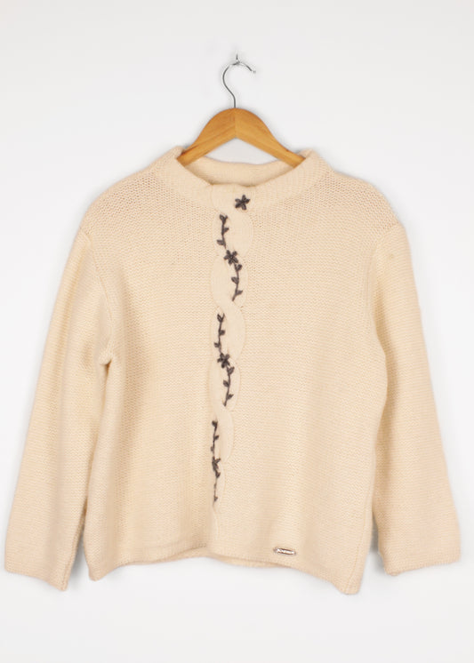 Woolen sweater in cream